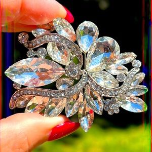 Gorgeous clear crystal Brooch. Perfect accent to any coat outfit or perfect gift